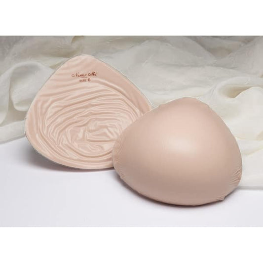 Nearly Me - #870 Basic Standard Weight Tapered Oval Silicone Mastectomy  Breast Form, Beige (Size: 1) at  Women's Clothing store: Bra Inserts